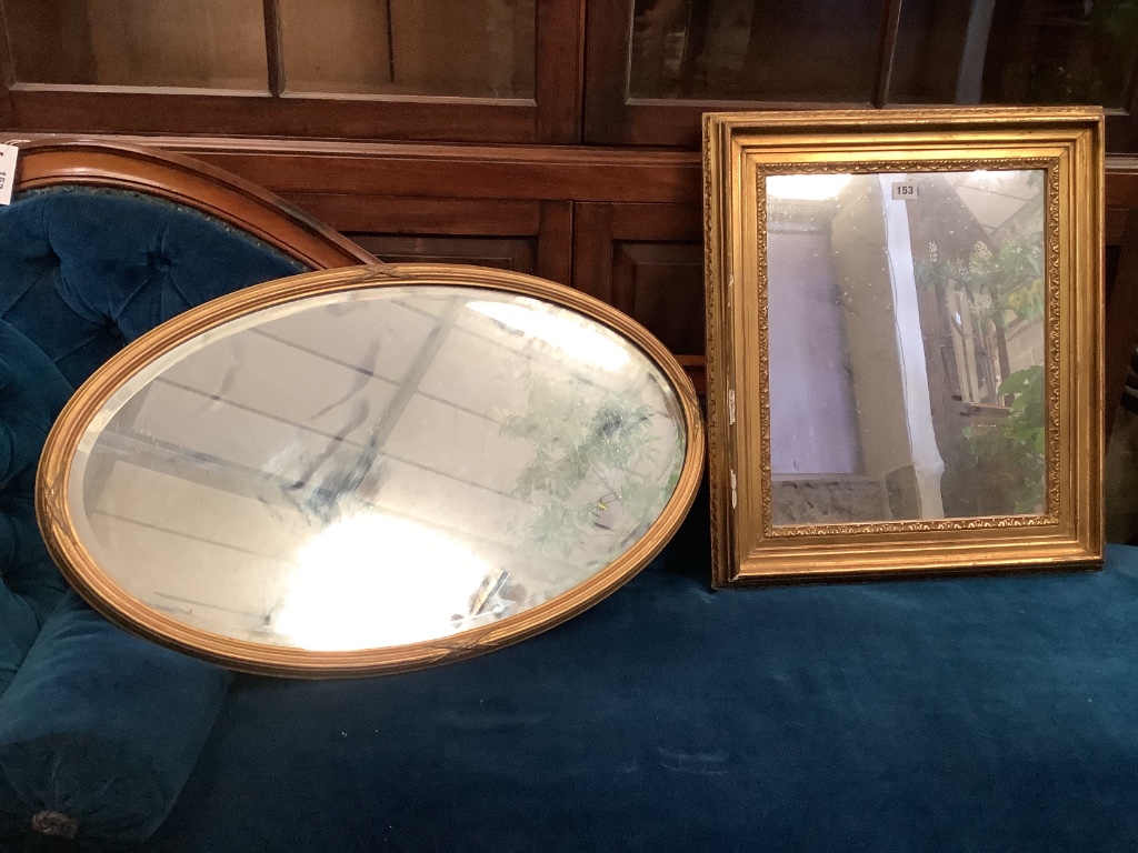 A rectangular gilt framed wall mirror, width 52cm, height 60cm, together with an oval gilt framed wall mirror